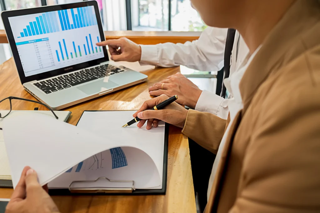 Advisor or consultant reviewing financial data